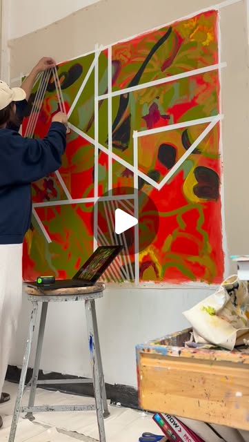Taping lines on a Terrarium painting